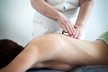 Manual lymphatic drainage performed by a doctor.