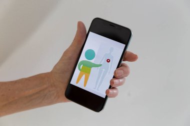 Diagram on a mobile phone to evaluate pain threshold.