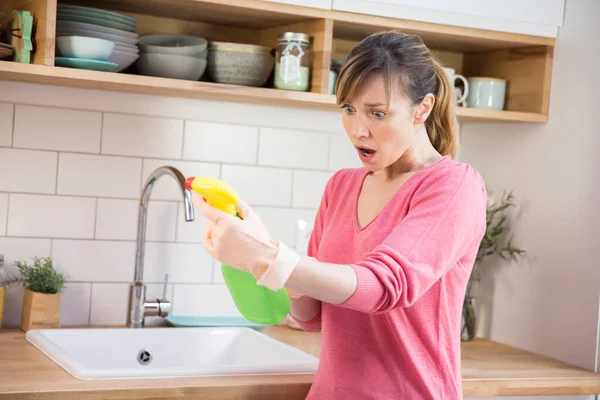 Woman Using Conventional Cleaning Product — Stok Foto