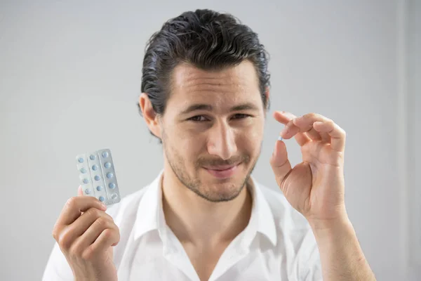 Man Taking Contraceptive Pill — Stok fotoğraf