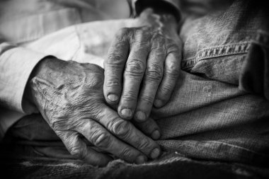 Close-up of the hands of an elderly man.