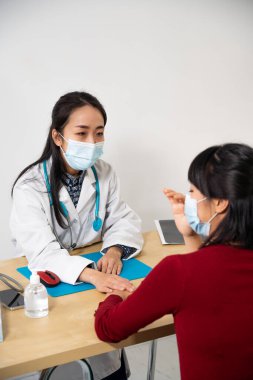 Doctor announcing an unfavorable diagnosis to his patient