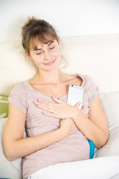 Woman Worshiping Her Smartphone Dependency Addiction Behavior — Zdjęcie stockowe