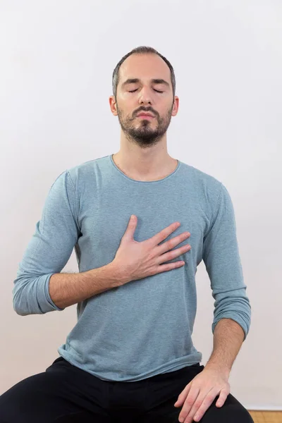 Man Carrying Out Relaxation Techniques —  Fotos de Stock