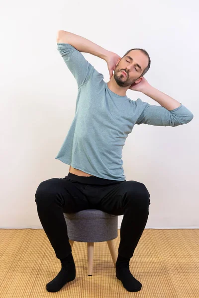 Man Carrying Out Relaxation Techniques — Stockfoto