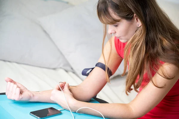 Woman Giving Herself Injection Her Arm Smartphone — 스톡 사진