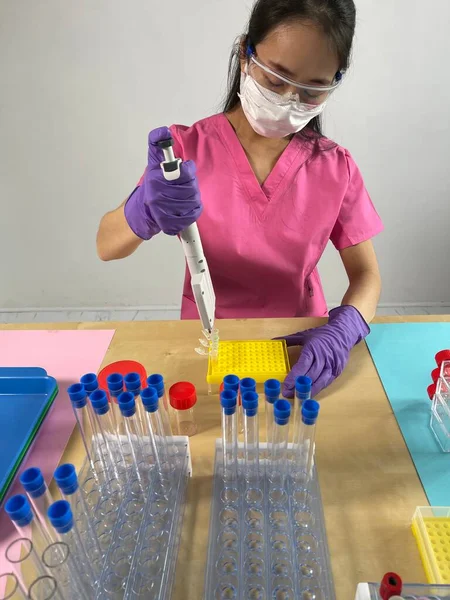 Woman Injecting Substance Tube Using Multichannel Pipette — Stock Photo, Image