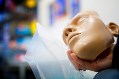 First aid training: mask used for mouth to mouth on mannequins.
