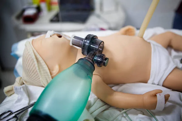 Continuous training of midwives and obstetricians on resuscitation in the delivery room with a mannequin.