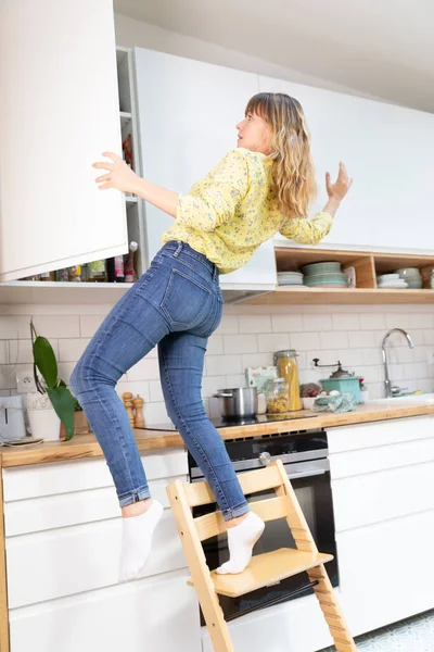 Young Woman Her Kitchen Falling Chair — Foto de Stock