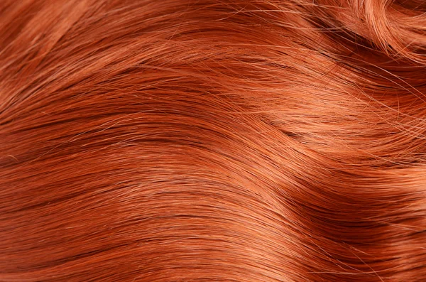 Belo cabelo vermelho como pano de fundo — Fotografia de Stock