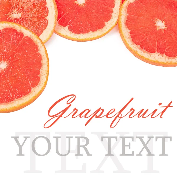 Яркий грейпфрут на белом фоне — стоковое фото