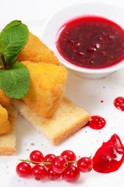 Cheese in breadcrumbs with currant jam clipart
