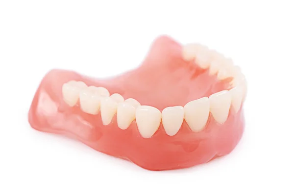 Sada umělých zubů izolovaných na bílém pozadí — Stock fotografie