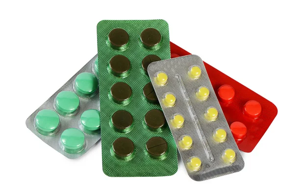 Tabletek w opakowaniu, na białym tle — Zdjęcie stockowe