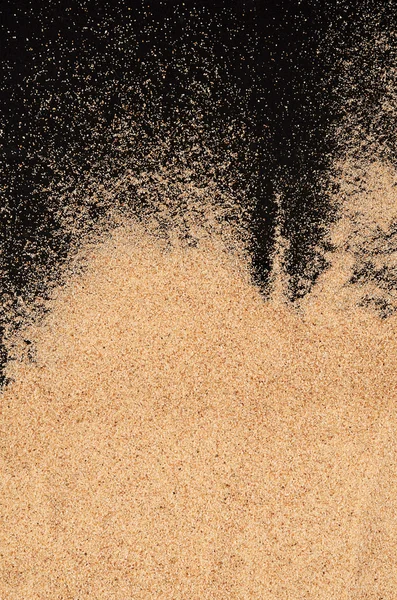 Le sable sur le fond noir — Photo