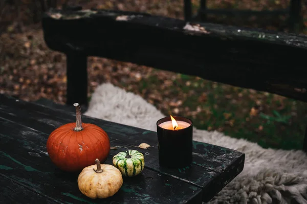 Pumpkins Burning Candle Old Wooden Table Fur Bench Autumn Comosition — Stock Photo, Image