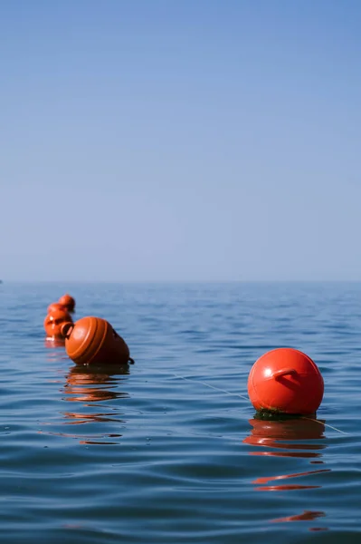 Orange Floating Buoys Sea Human Life Saving Concept Blue Sky — Foto de Stock