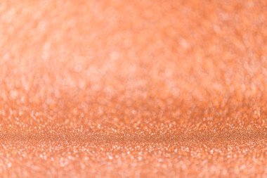 Soyut bulanık turuncu parlak arkaplan ve fotokopi alanı. Bokeh 'li boş, parlak mercan arka planı.