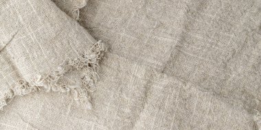 Doğal sert keten dokusu. Fotokopi alanı olan bej gri kırsal masa örtüsü üst görünümü