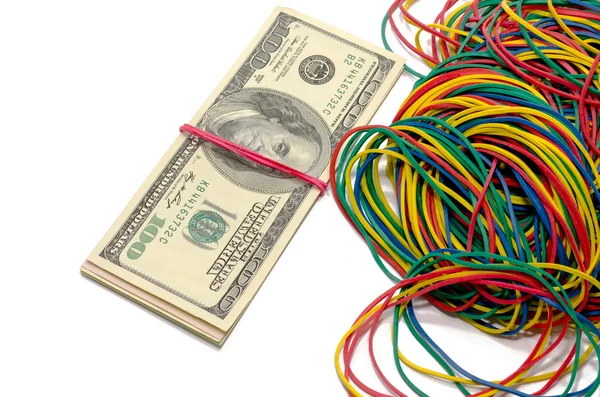 Dollars and elastic bands — Stock Photo, Image
