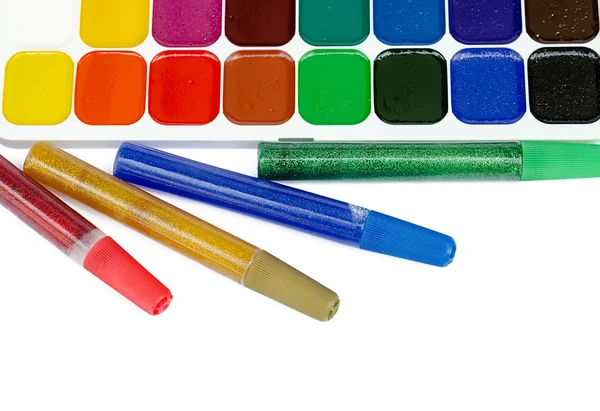 Pinturas y pegamento de color para niños Imagen De Stock