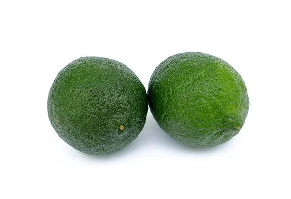 Two limes on a white background — Stock Photo, Image