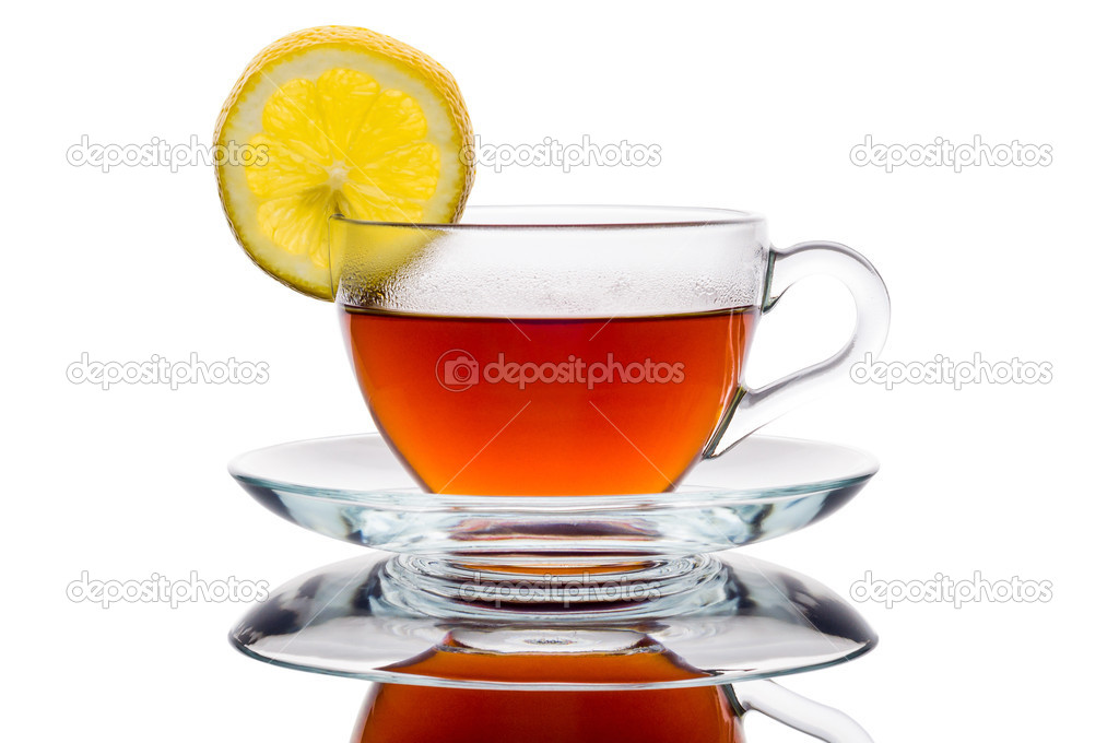 Cup of tea and lemon isolated on white background