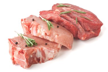Raw pork chops and beef medallions clipart