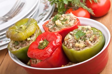 Stuffed peppers in a dish clipart