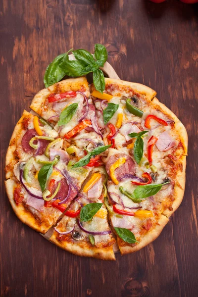 Sliced tasty pizza — Stock Photo, Image