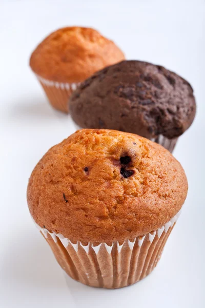 Three muffins in a row — Stock Photo, Image
