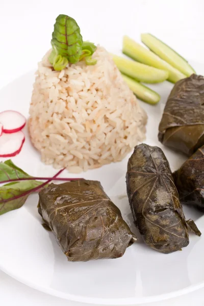 Stuffed grape leaves with rice and vegetables — Stock Photo, Image