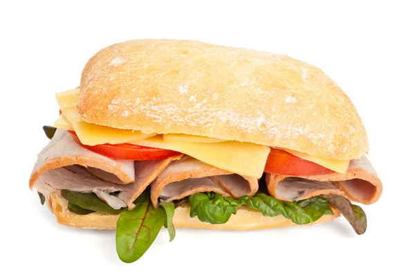 Ciabatta bread sandwich stuffed with meat, cheese and vegetables — Stock Photo, Image