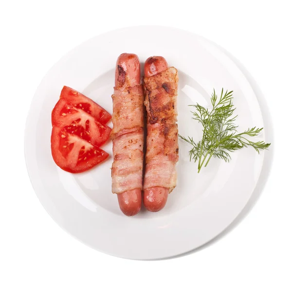 Vienna sausages wrapped in bacon — Stock Photo, Image