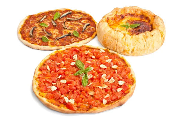 Grupp av tre pizzor — Stockfoto