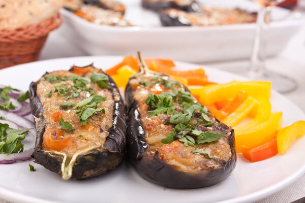 Cheese and mushrooms aubergines on a plate