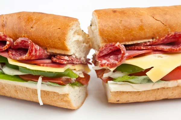 Two halves of long baguette sandwich — Stock Photo, Image