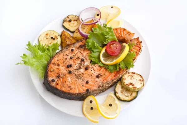 Salmon with vegetables and lemon — Stock Photo, Image