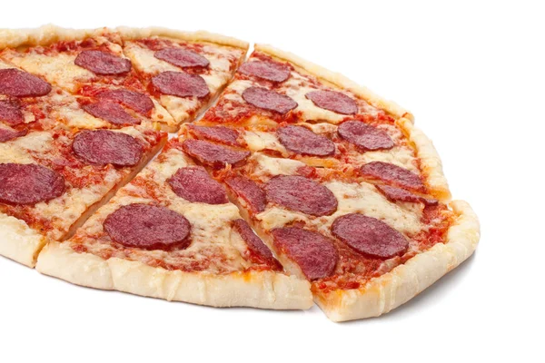 Sliced whole salami pizza — Stock Photo, Image