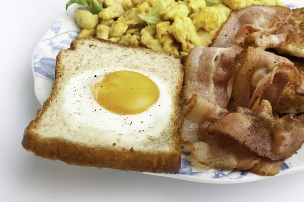 Eggie bread and fried bacon — Stock Photo, Image