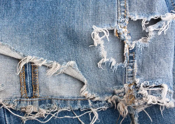 Strappato vecchio blu jeans sfondo — Foto Stock