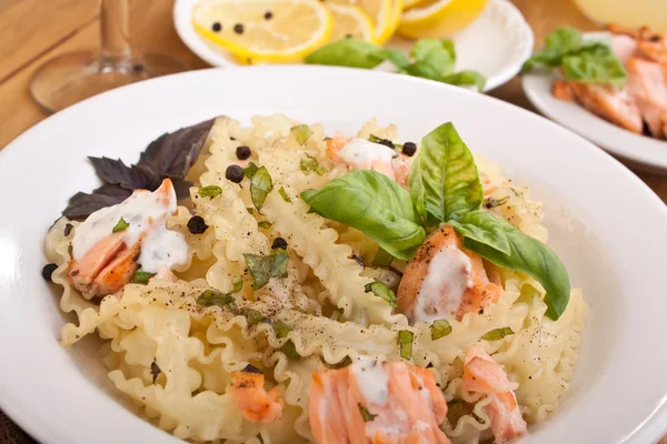 One serving of pasta mafalde with salmon — Stock Photo, Image