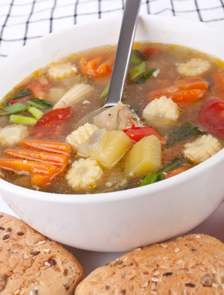 Bowl of chicken and vegetable soup — Stock Photo, Image