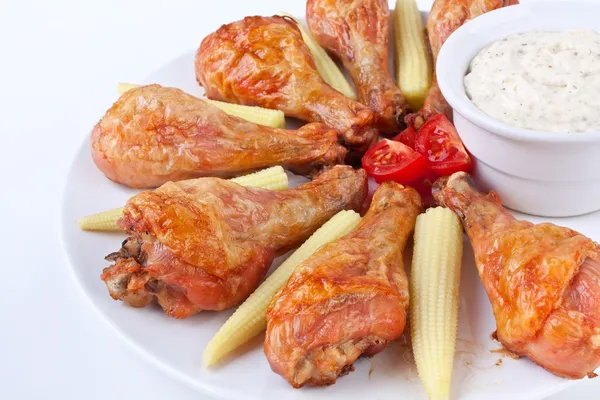 Buffalo chicken legs served with cream sauce — Stock Photo, Image