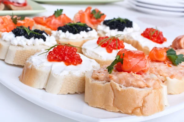 Large group of sandwiches with seafood — Stock Photo, Image