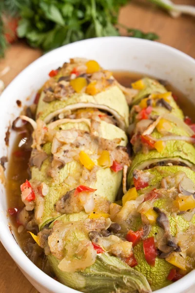 Roasted marrow squash stuffed with vegetables, meat and mushrooms — Stock Photo, Image