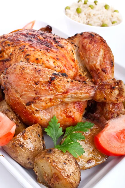 Roasted chicken with roasted potatoes — Stock Photo, Image