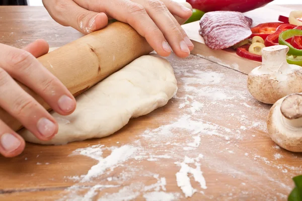 Kneading dough for pizza — Stock Photo, Image
