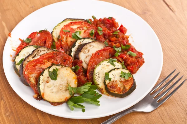 Baked vegetables with tomato sauce — Stock Photo, Image